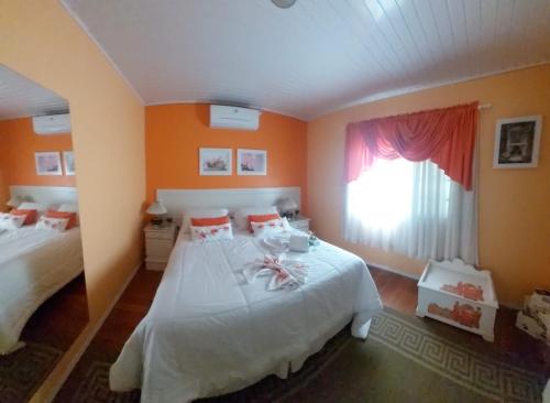 Postel nebo postele na pokoji v ubytování Aluguel de Temporada Tere Castilhos