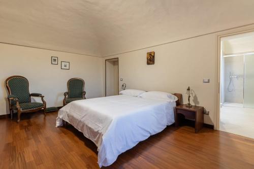 Ένα ή περισσότερα κρεβάτια σε δωμάτιο στο Villa Ca' Vecchia