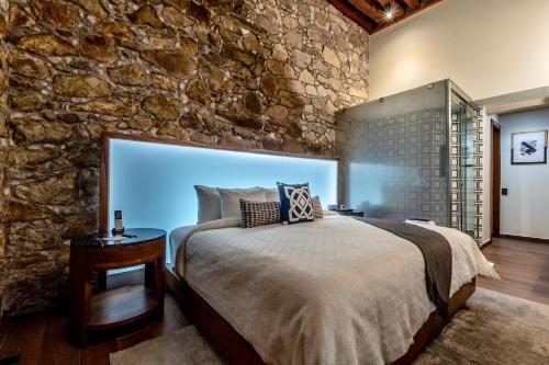 Ένα ή περισσότερα κρεβάτια σε δωμάτιο στο Nueve 25 Hotel Boutique