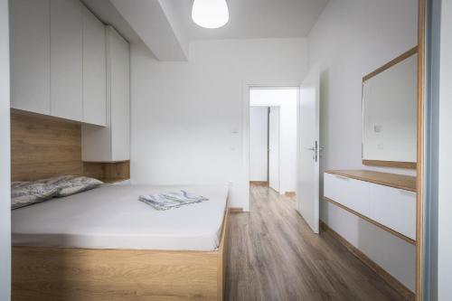 Postel nebo postele na pokoji v ubytování Sofija Apartments