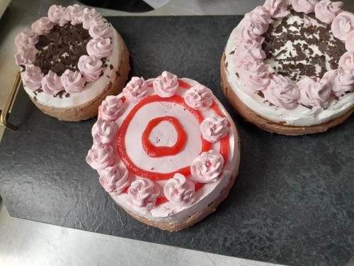 three different types of cakes sitting on a table at Landgasthaus Sankt Annen in Sankt Annen