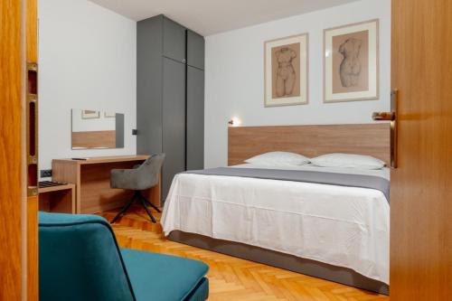 Posteľ alebo postele v izbe v ubytovaní Apartments Kudelik
