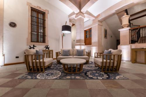 Χώρος καθιστικού στο Nueve 25 Hotel Boutique