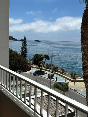 a view of the ocean from a balcony at Delphinhaus in Almuñécar