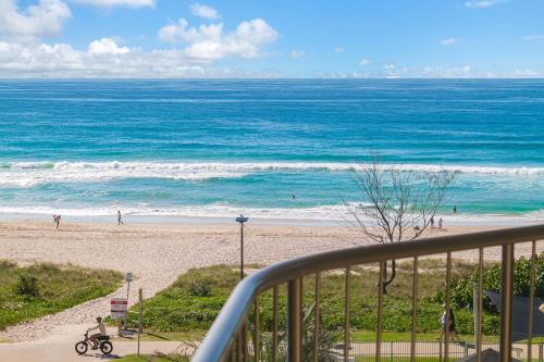 a view of the beach from a balcony at San Simeon 33 in Gold Coast