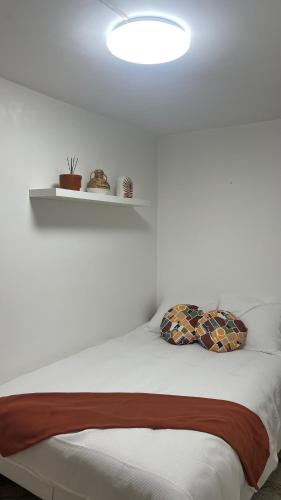 Postel nebo postele na pokoji v ubytování Appart Proche Orly