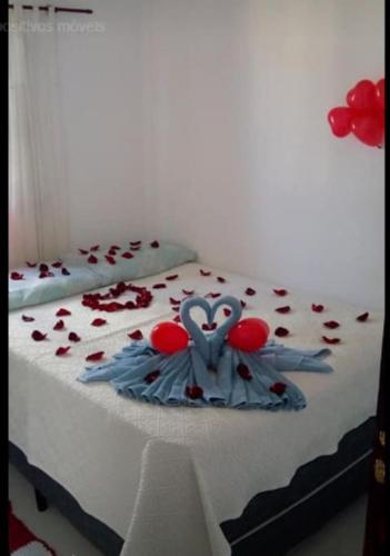 Una cama o camas en una habitación de POUSADINHA Enseada