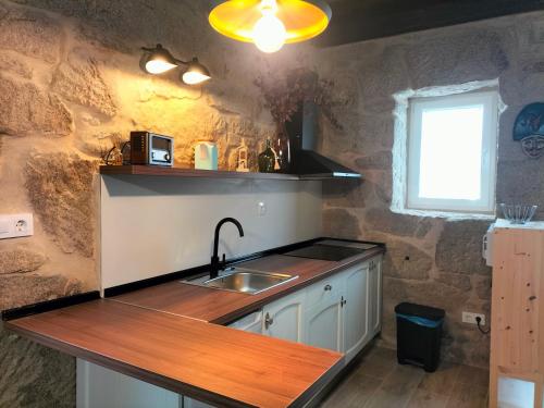 Η κουζίνα ή μικρή κουζίνα στο Casa Carradas