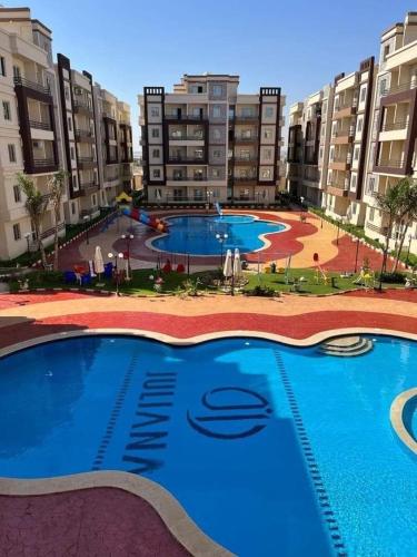 Gambar di galeri bagi شاليه فى الساحل الشمالى منتجع جوليانا أمام قرية السويس - North Coast Chalet for relaxation di Dawwār Muşādif Yūnus