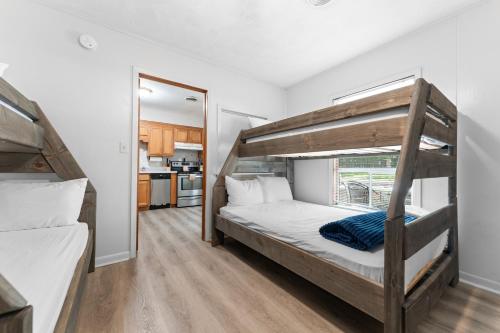 Ένα ή περισσότερα κρεβάτια σε δωμάτιο στο Osage Resort