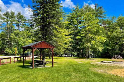 a picnic table and a gazebo in a park at Crescent Corner in Waterboro