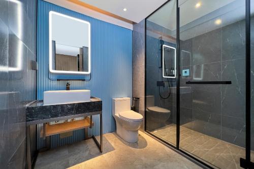 Koupelna v ubytování Echarm Hotel Guangzhou Dongpu Financial City Pazhou Convention Center - Free shuttle bus for Canton Fair