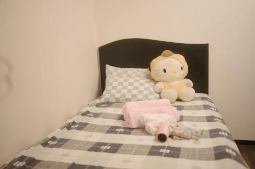 Katil atau katil-katil dalam bilik di Yoshidoku Inn Domemae 1 - Close to USJ World Expo Airport吉徳家庭旅館1ドーム前近万博USJ空庭菓匠温泉大阪城公园难波心斋桥関西空港直达免费寄存旅行箱
