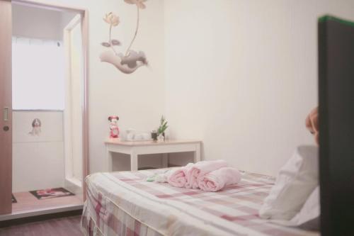 Katil atau katil-katil dalam bilik di Yoshidoku Inn Domemae 1 - Close to USJ World Expo Airport吉徳家庭旅館1ドーム前近万博USJ空庭菓匠温泉大阪城公园难波心斋桥関西空港直达免费寄存旅行箱