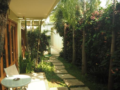 Un jardín fuera de The Gecho Inn Town