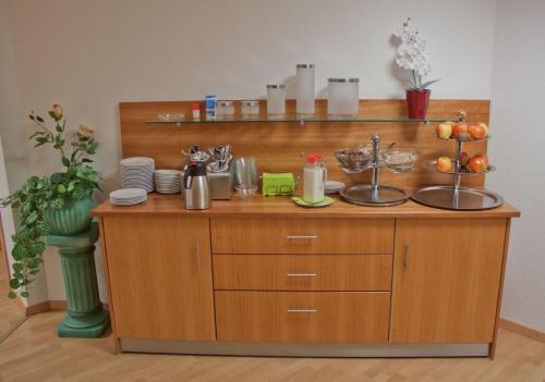 a counter with food on top of it at Hotel am Drömling in Versfelde