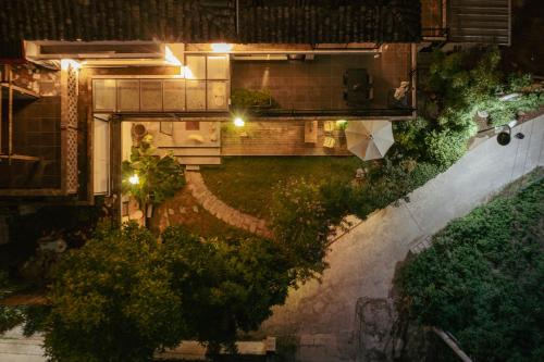 an overhead view of a garden at night at Yangshuo Shui Mo Ju courtyard in Yangshuo