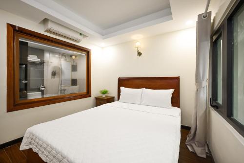 Katil atau katil-katil dalam bilik di Red Sun Airport Saigon Hotel