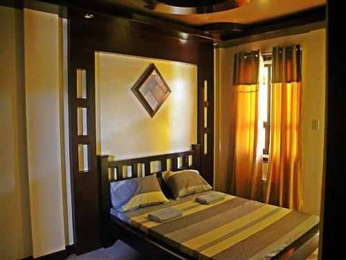 Postel nebo postele na pokoji v ubytování Costa Villa Beach Resort