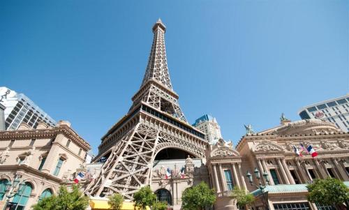 a view of the eiffel tower in front of a building at Luxury Suites International by Vdara in Las Vegas