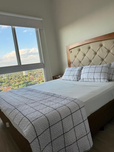 Postel nebo postele na pokoji v ubytování Piso 21, Vista Privilegiada, Forum Molas