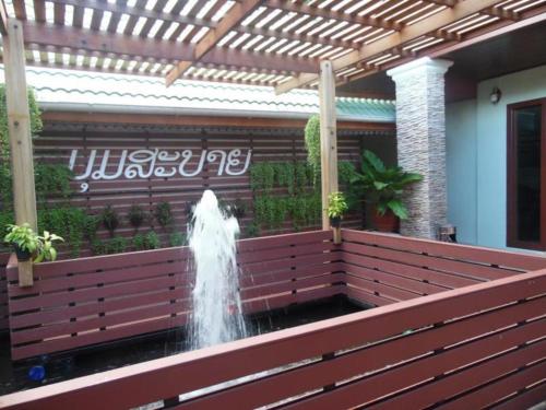 a water fountain in the middle of a building at Hungheuang Hotel in Savannakhet