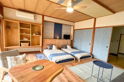 Cama o camas de una habitación en 隠岐シーサイドホテル鶴丸