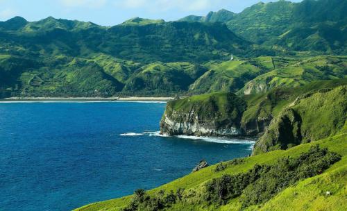 a view of the ocean from a mountain at Fundacion Pacita in Basco