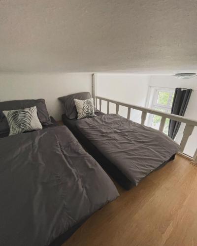 Postel nebo postele na pokoji v ubytování MEG Apartment