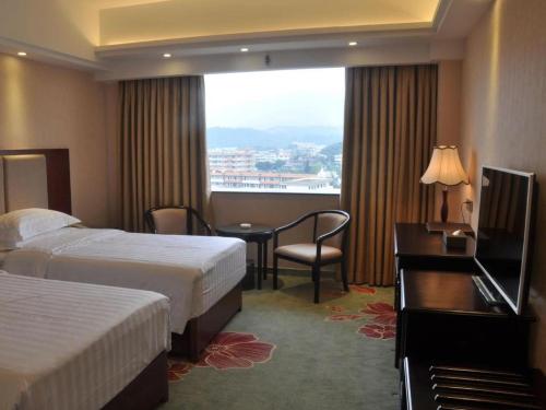 Gui Feng Hotelにあるベッド
