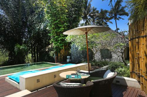 Πισίνα στο ή κοντά στο The Purist Villas & Spa Ubud