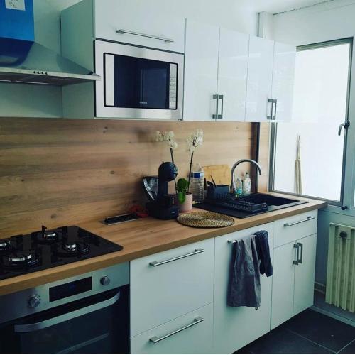 Photo de la galerie de l'établissement Appartement proche Disneyland Paris 58m2-cœur du centre ville-parking, à Vaires-sur-Marne