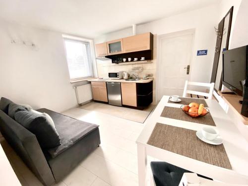 Η κουζίνα ή μικρή κουζίνα στο SKALNY apartamenty, pokoje