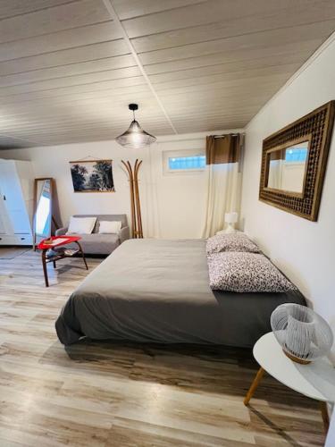 Postel nebo postele na pokoji v ubytování Le Corail