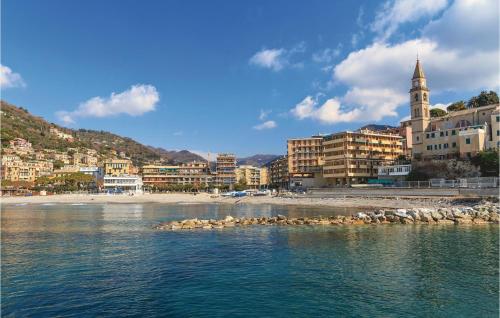 acean view of a city with a beach and buildings at Casa Rosmarino in Chiesanuova