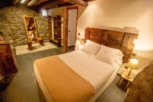 Postel nebo postele na pokoji v ubytování R de rural - Borda del Mollà