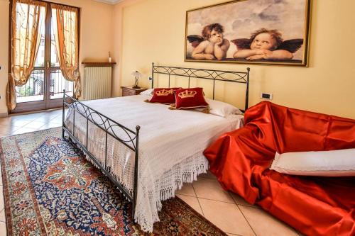 Un pat sau paturi într-o cameră la Trattoria Milani