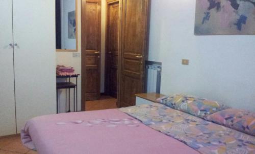 Katil atau katil-katil dalam bilik di Via Toscana House