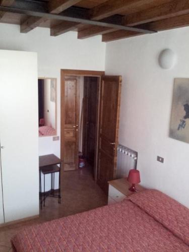 Katil atau katil-katil dalam bilik di Via Toscana House