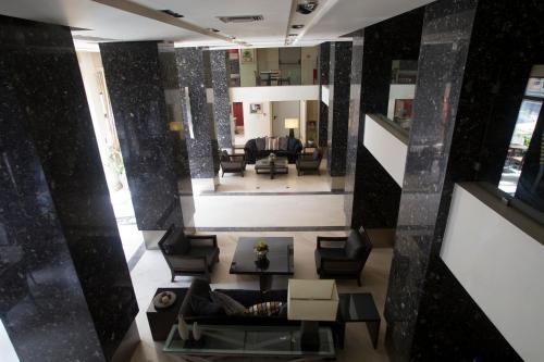 an aerial view of a living room with furniture at Davitel - Tobacco Hotel in Thessaloniki