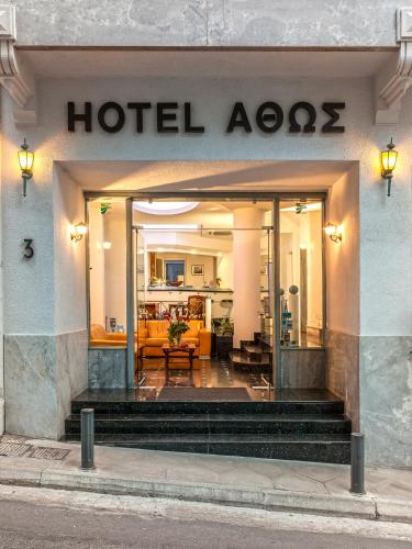a hotel entrance with a hotel room at Athos Hotel in Athens