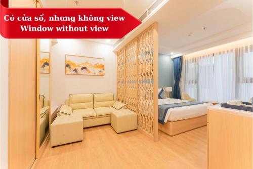 Ένα ή περισσότερα κρεβάτια σε δωμάτιο στο Canary Gold Hotel Quy Nhơn - Beachfront - Iconic Location