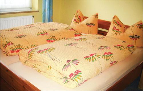 Ένα ή περισσότερα κρεβάτια σε δωμάτιο στο Cozy Apartment In Hohwacht With Kitchen