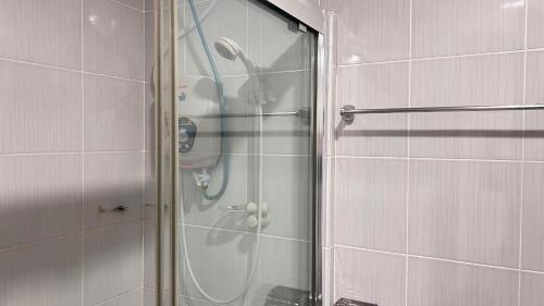 Koupelna v ubytování New YX oasis hotel 新悦喜雅居自助酒店