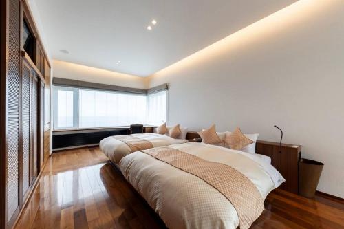 Ένα ή περισσότερα κρεβάτια σε δωμάτιο στο Villa Orchid