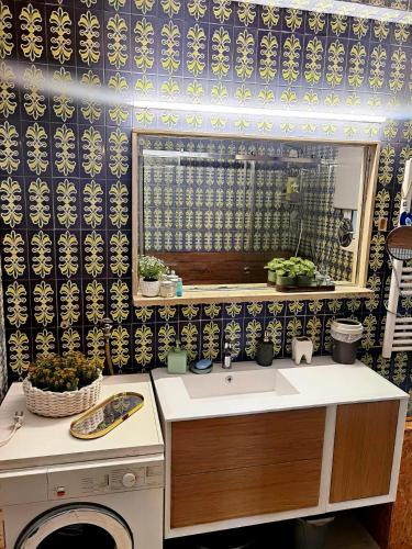 a kitchen with a sink and a window at 110 Sqm 2BR Edem beach luxury apartment in Athens