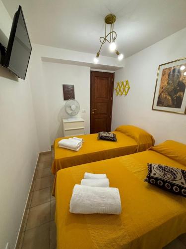 Ένα ή περισσότερα κρεβάτια σε δωμάτιο στο Porta Trapani Guest House