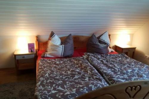Katil atau katil-katil dalam bilik di Feha 30 Ferienhaus Delphin in ruhiger Lage