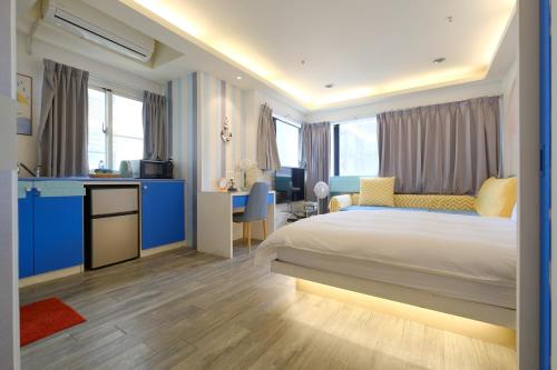 Ένα ή περισσότερα κρεβάτια σε δωμάτιο στο 85 Asia Hotel