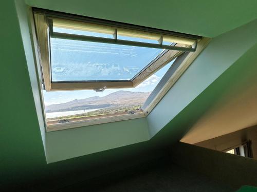 a window in a room with a view at Jura - The Black Hut in Isle of Jura